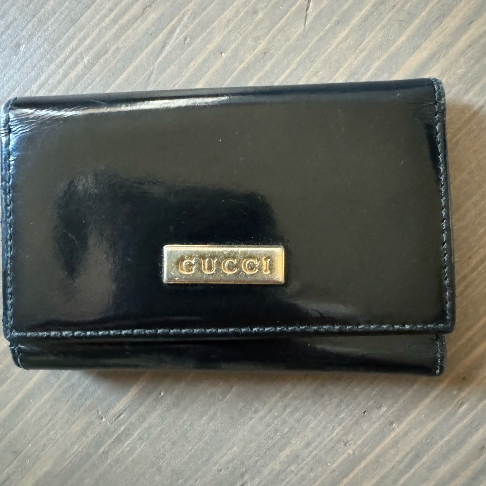 Gucci Black Wallet with Gold Logo